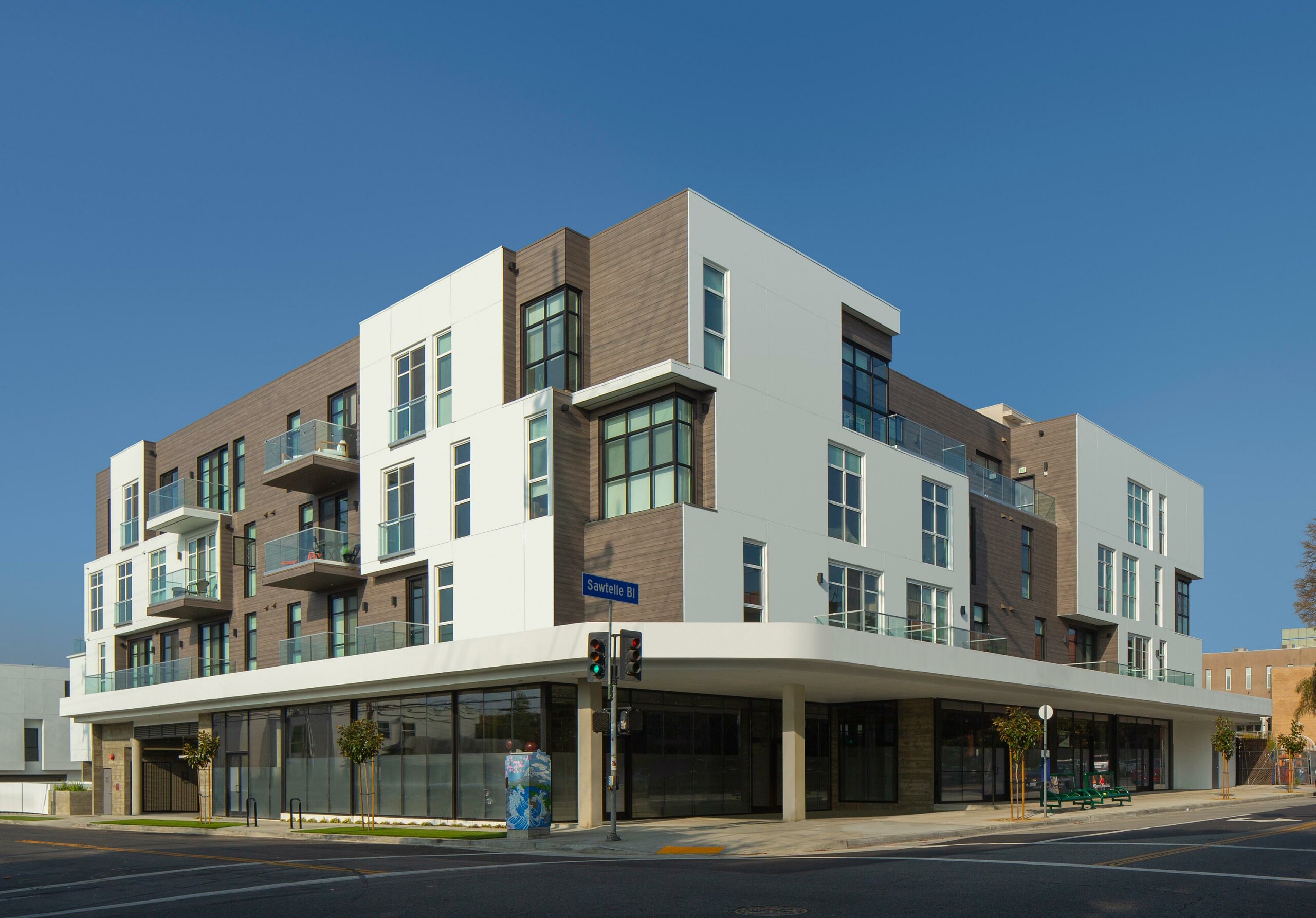 An outdoor shot of the All Weather Door and Window project at the SW apartments.