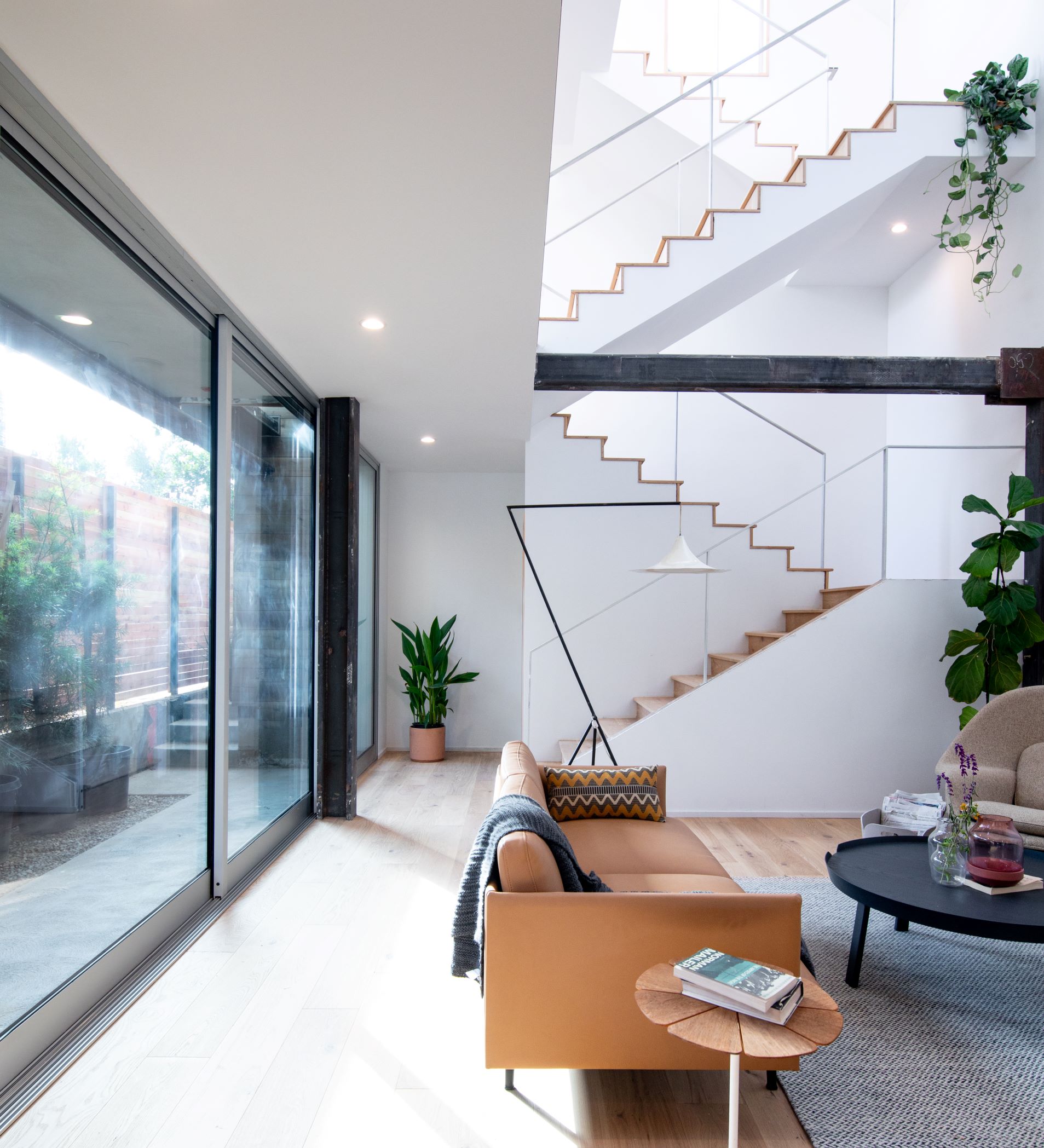 Precision glazing system connecting interior and exterior with zero sightline clutter